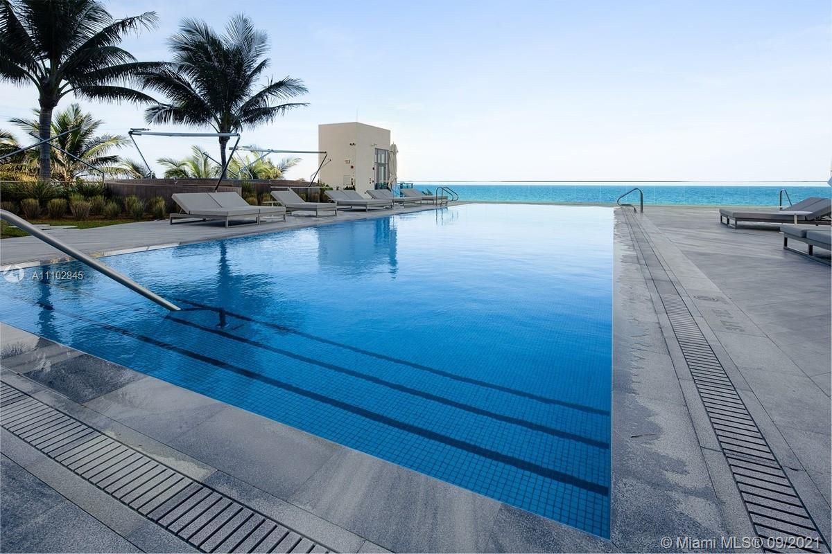 Modern gym in luxury Sunny Isles Beach villa, Miami, with ocean views for sale