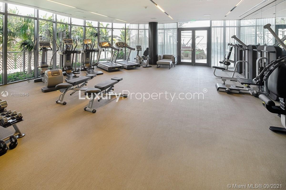 Luxurious living room in Miami villa, modern decor, comfortable seating, elegant design