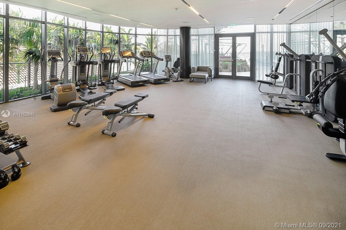 Luxurious living room in Miami villa, modern decor, comfortable seating, elegant design