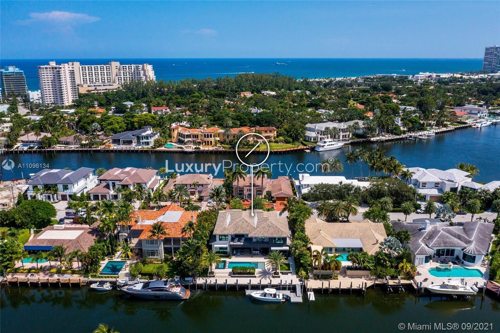 Aerial view of luxury Mediterranean villa in Fort Lauderdale, Florida with waterfront and pool
