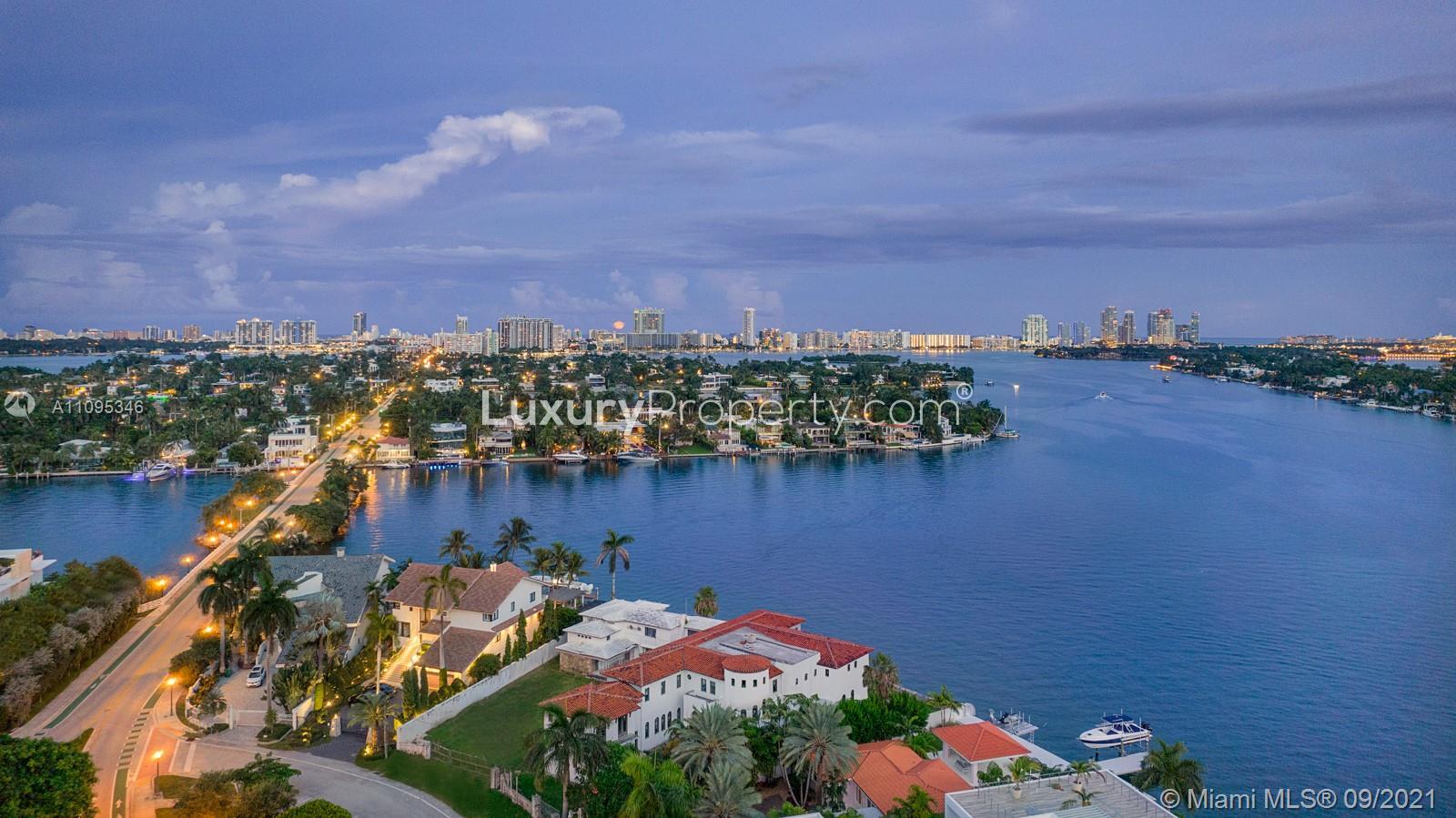 Aerial view of Venetian Islands luxury villa for sale in Miami, Florida at dusk