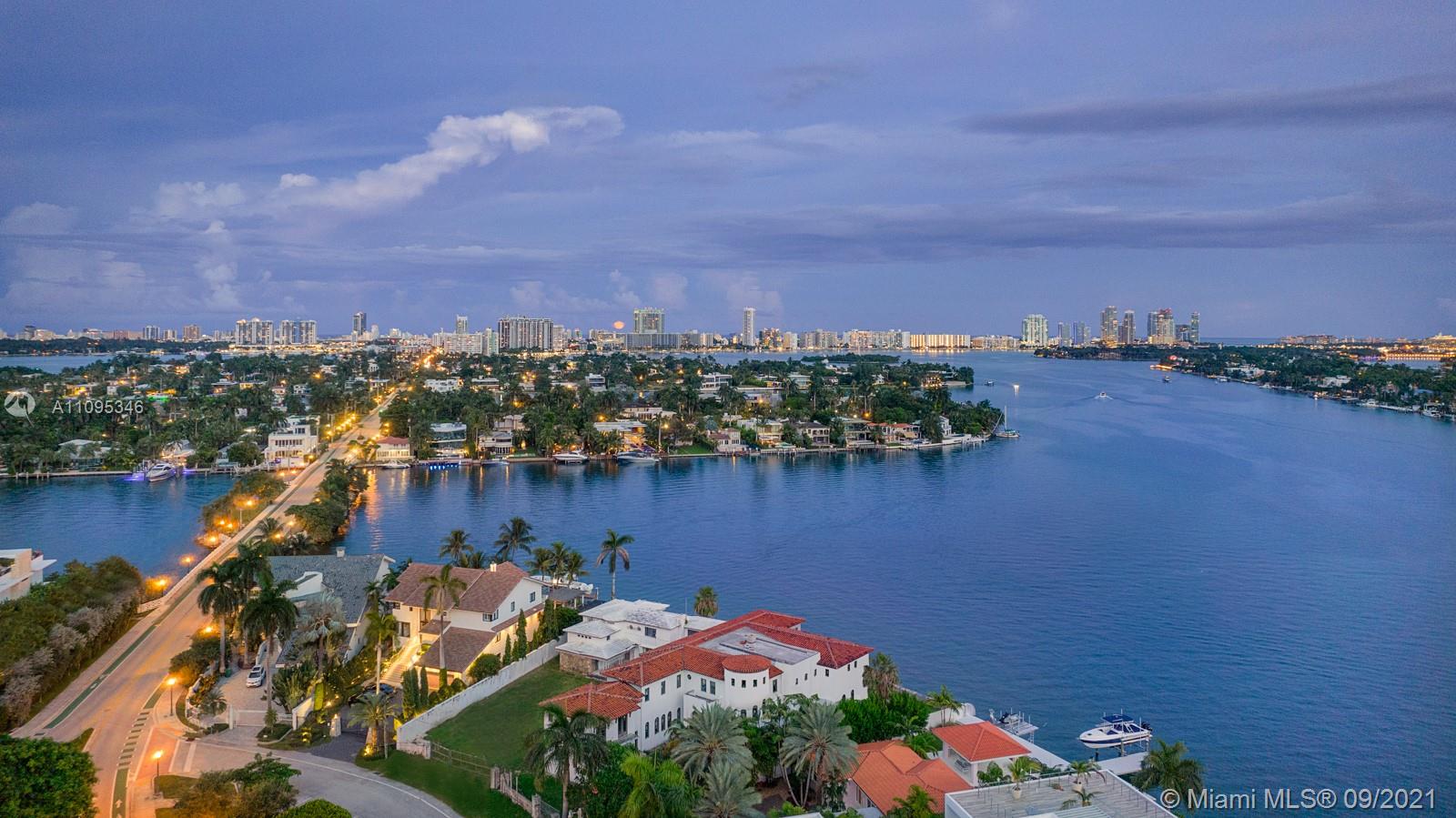 Aerial view of Venetian Islands luxury villa for sale in Miami, Florida at dusk