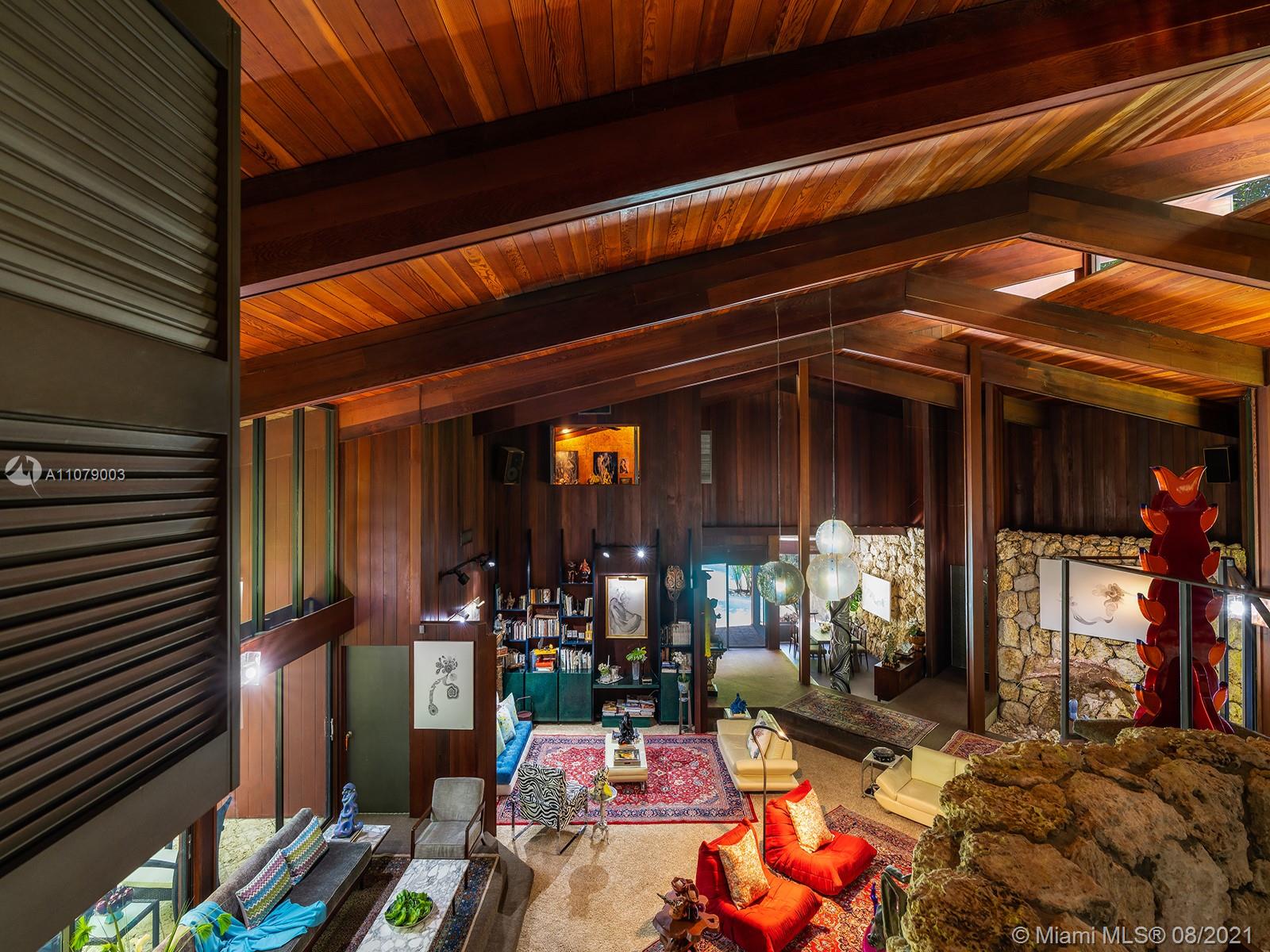 Home office in Miami Beach villa with wooden walls and large window, LP09739