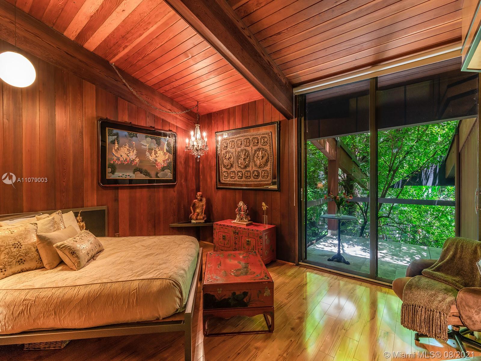 Interior of luxurious Miami Beach villa with modern decor and wooden accents, LP09739