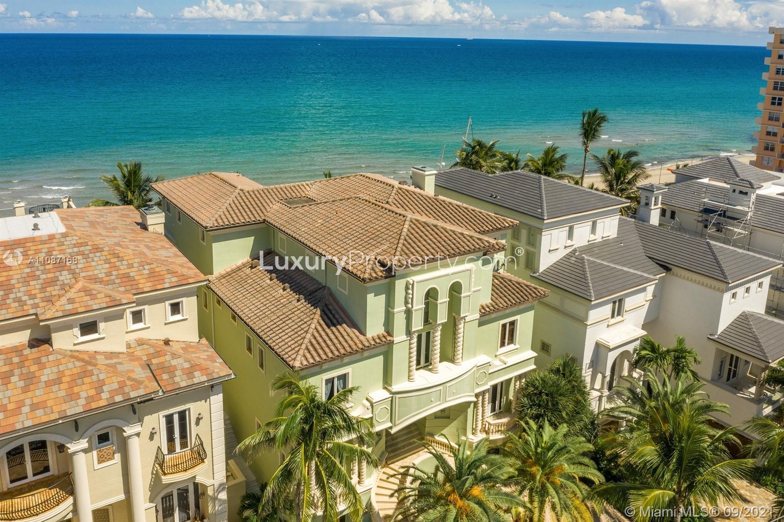 Aerial view of luxury oceanfront villa on Highland Beach, Florida, with stunning sea views