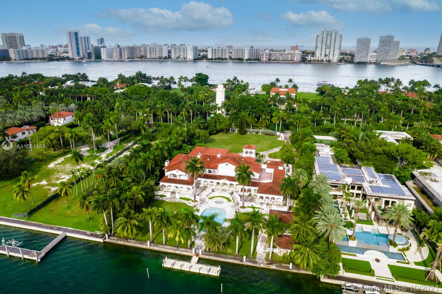 Luxurious Miami Beach villa pool with stunning sunset view on Star Island Drive