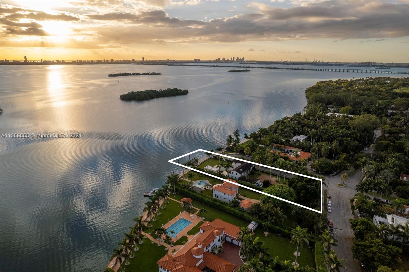 Aerial view of luxurious villa estate at 5901 N Bayshore Dr, Miami, Florida, waterfront location