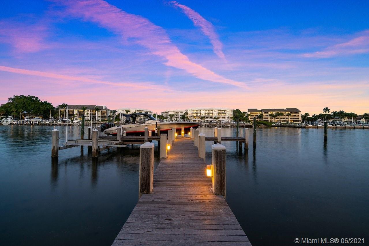 Waterfront luxury villa dock at sunset, Miami, Florida estate for sale, Ref LP09791