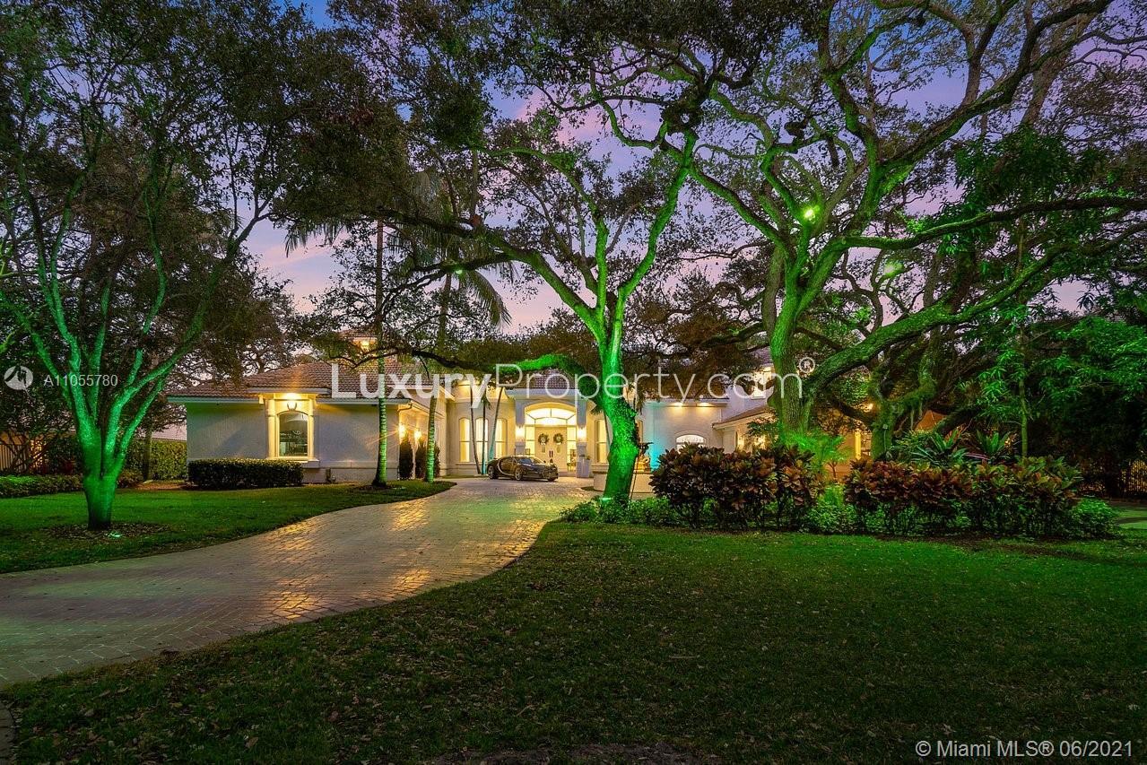 "Elegant entrance of luxury Miami villa for sale on Wilsee Rd, Florida, LP09791.",Luxury waterfront villa at sunset, 2270 Wilsee Rd, Miami, for sale