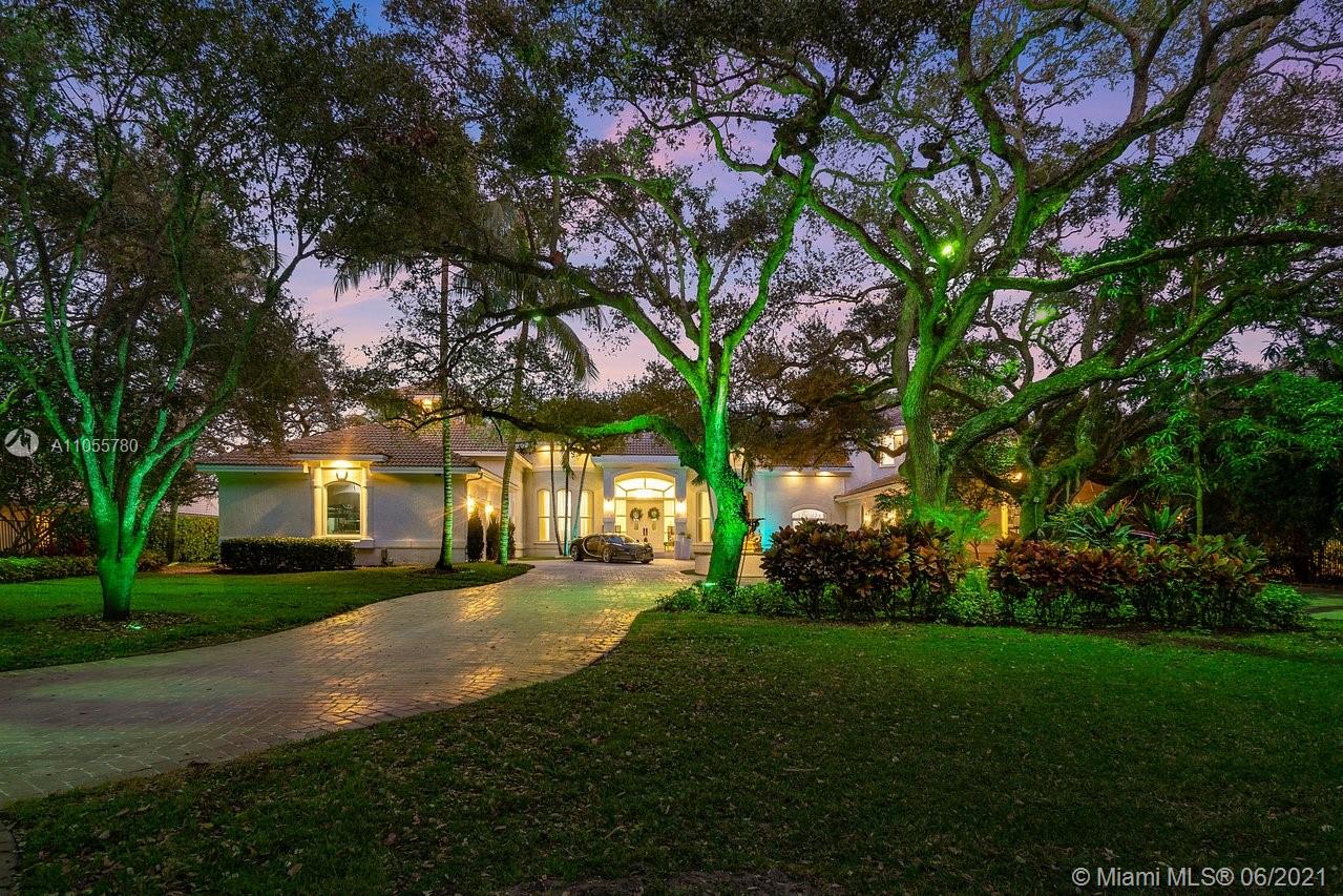 "Elegant entrance of luxury Miami villa for sale on Wilsee Rd, Florida, LP09791.",Luxury waterfront villa at sunset, 2270 Wilsee Rd, Miami, for sale