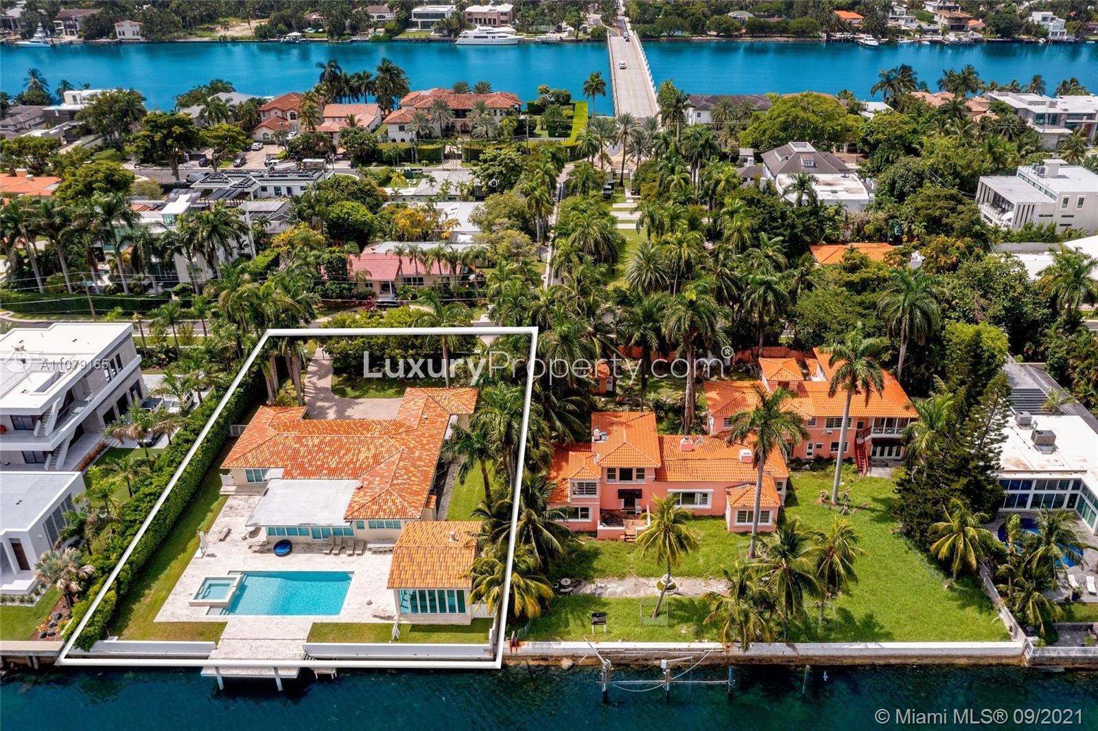 Bayfront villa with pool and lush greenery on Hibiscus Island, Miami Beach, for sale