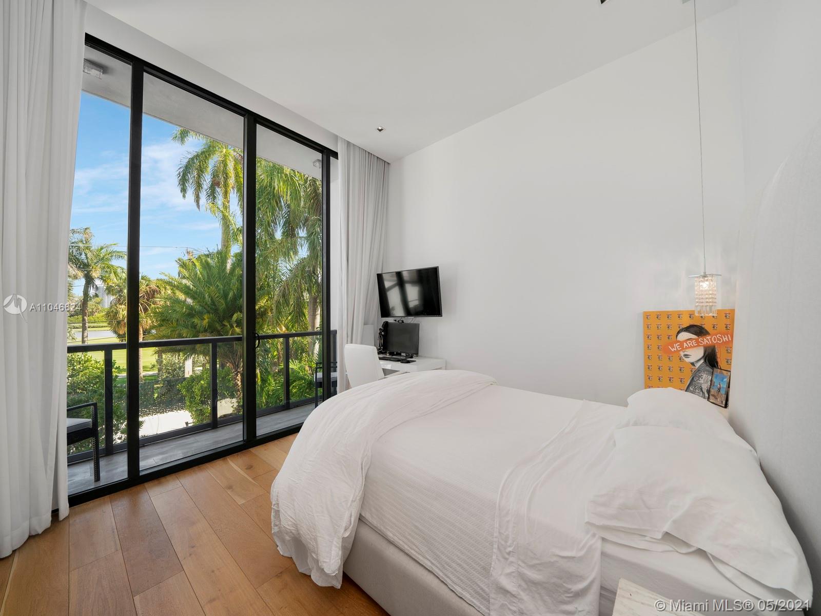 Modern Miami Beach villa with pool, spacious outdoor area, 5 bedrooms, for sale