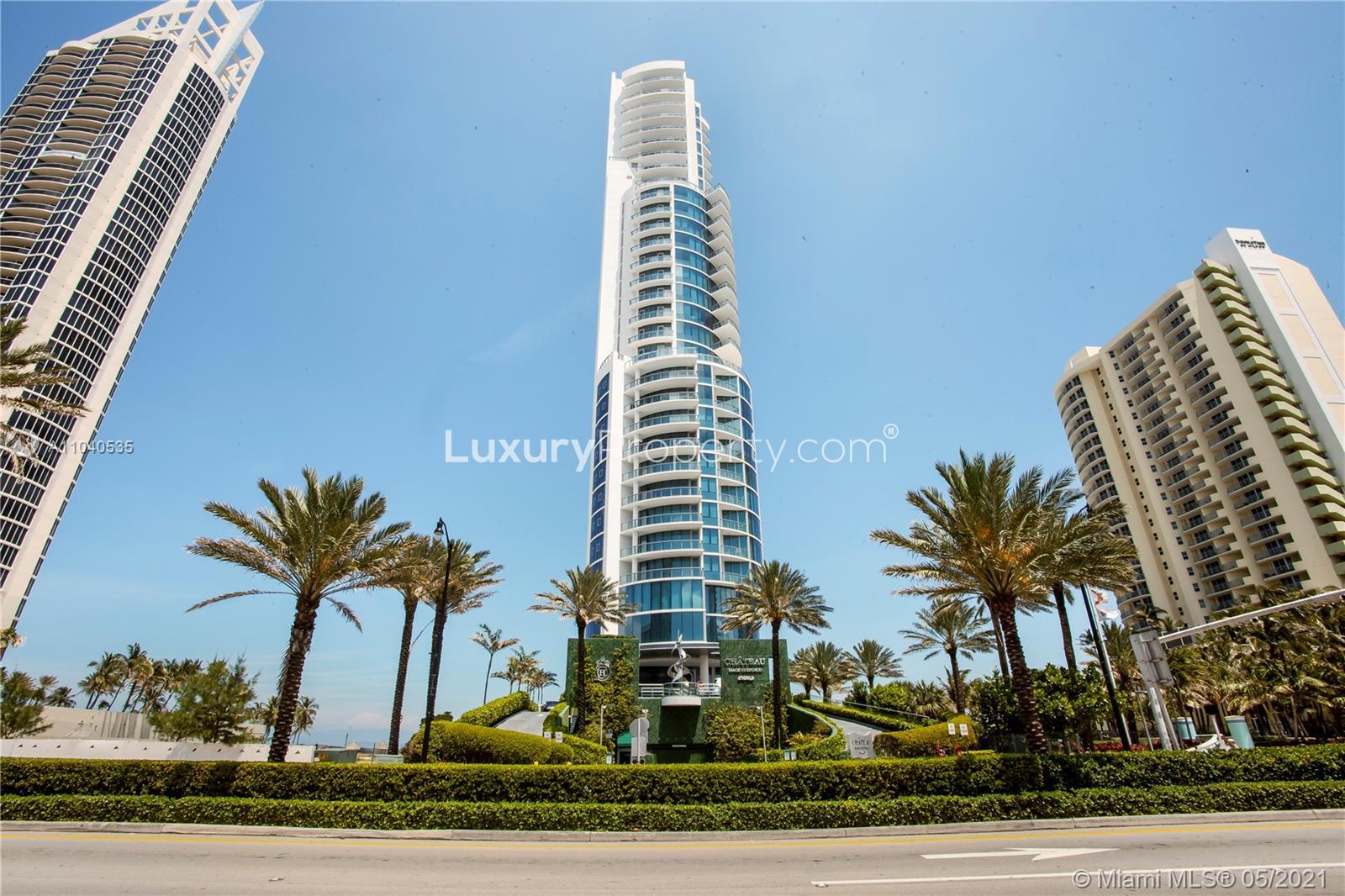 Aerial view of Miami beachfront high-rise buildings near 17475 Collins Ave, Florida