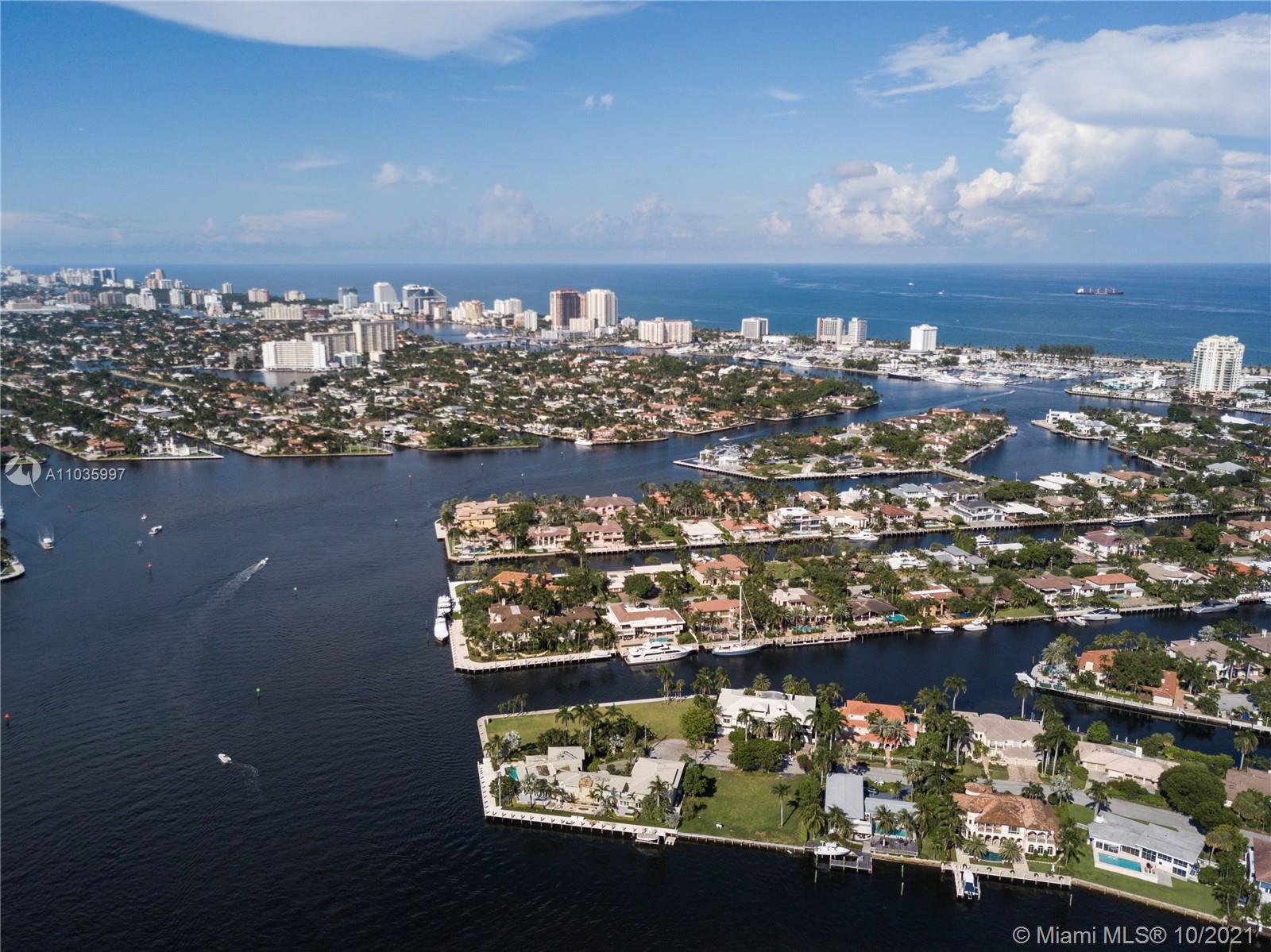 Waterfront villa in Fort Lauderdale, Florida, with lush greenery and canal views