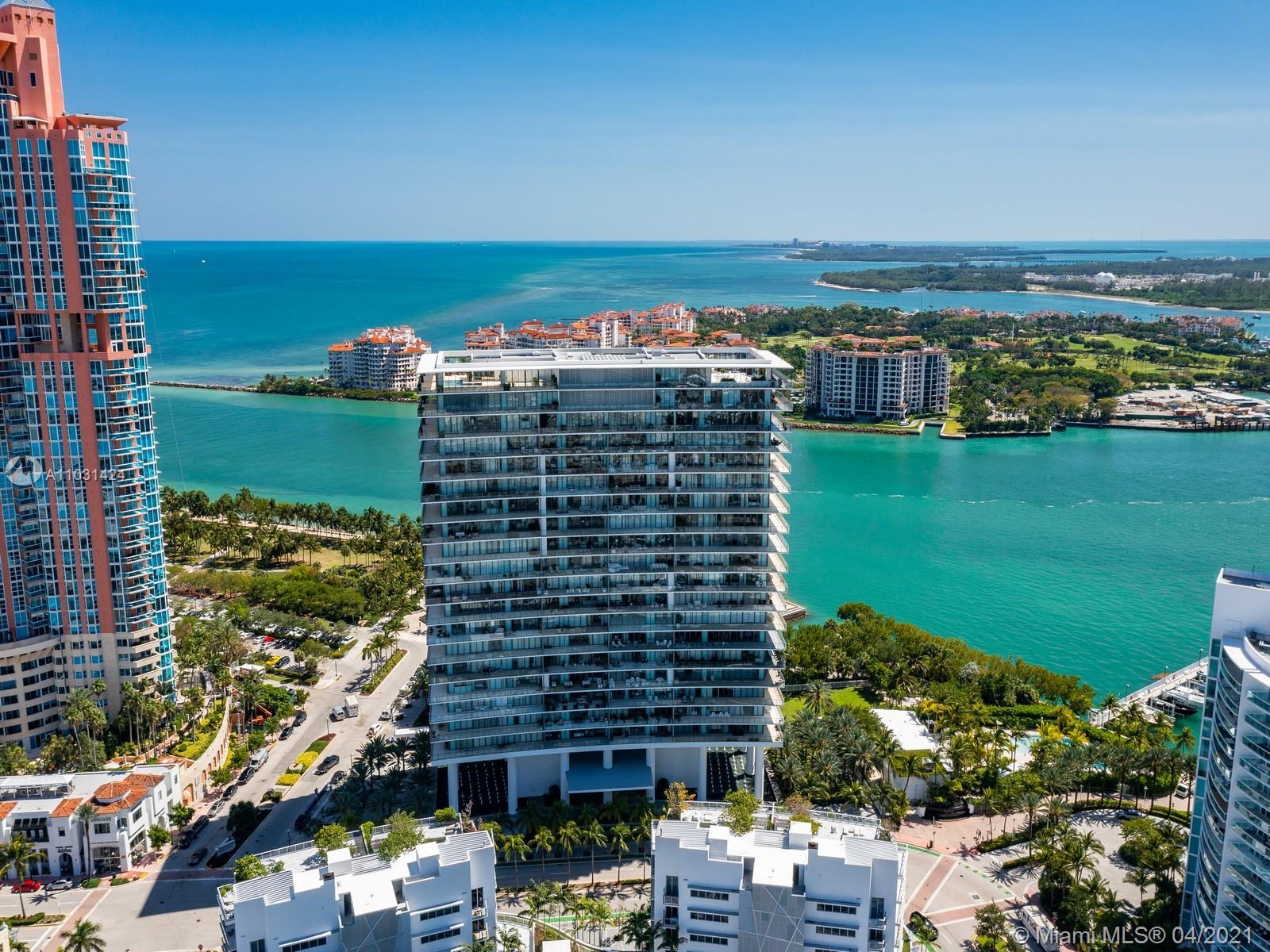 Aerial view of luxury villa at 800 S Pointe Dr, Miami, overlooking the ocean