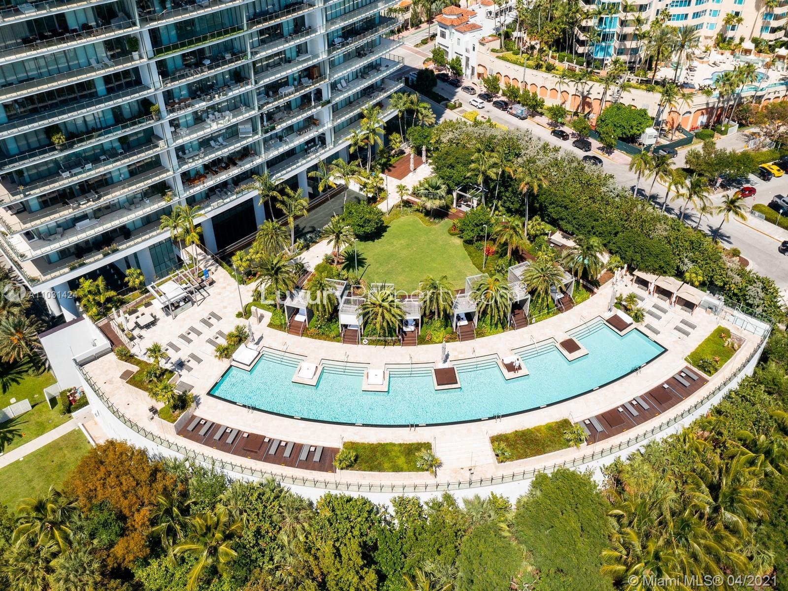 Aerial view of luxury Miami villa at 800 S Pointe Dr with ocean backdrop