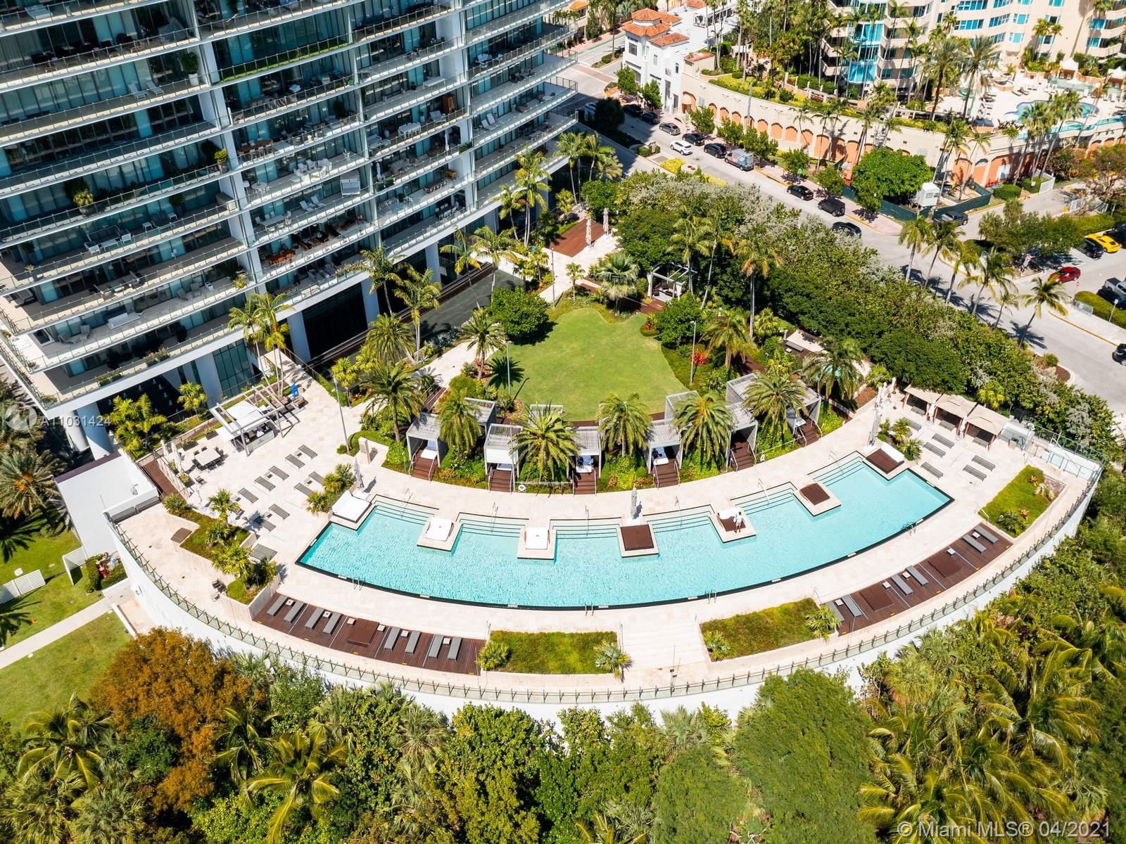 Aerial view of luxury Miami villa at 800 S Pointe Dr with ocean backdrop