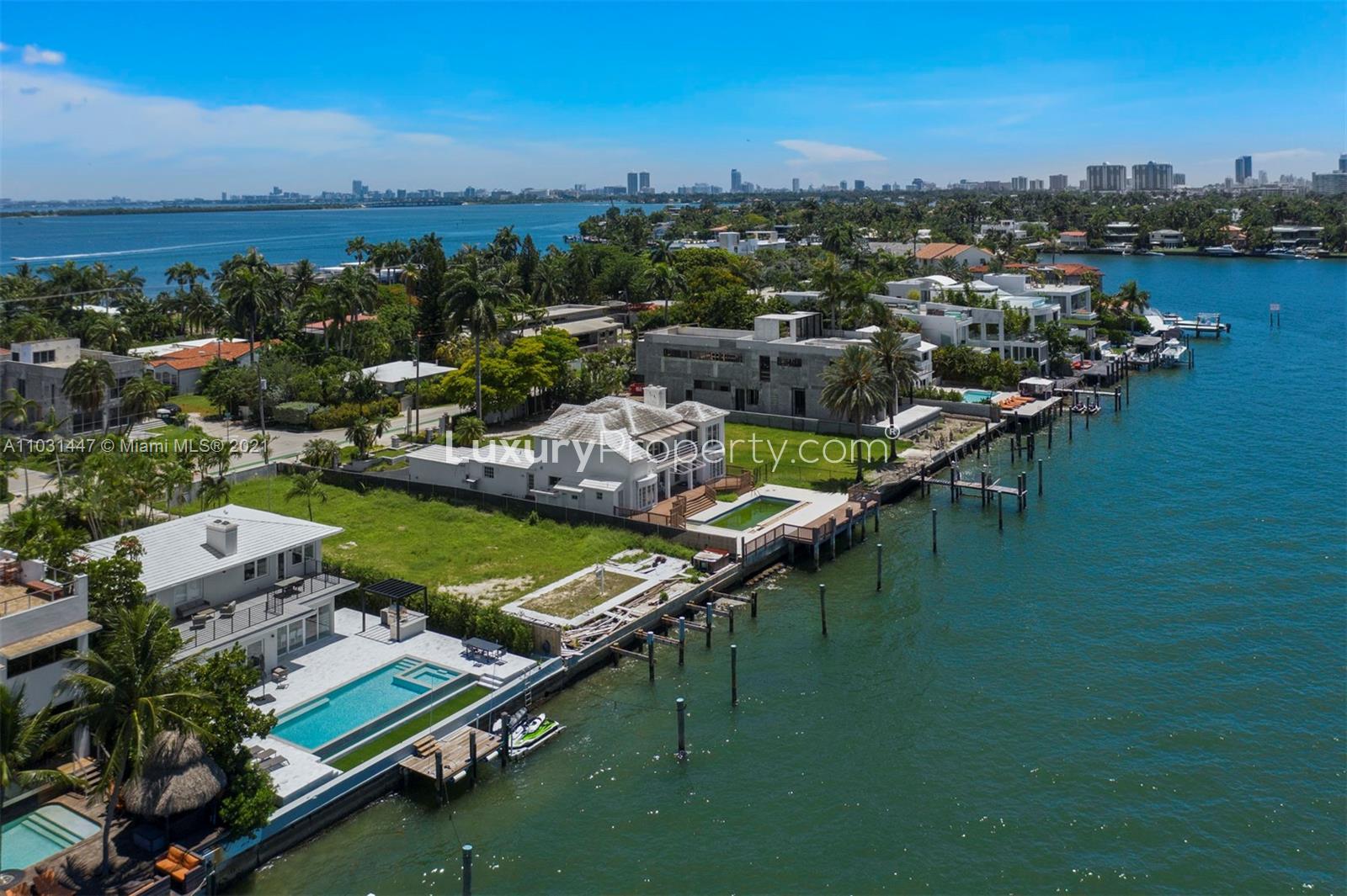 Aerial view of waterfront villa for sale in Miami, Florida, showcasing luxury living