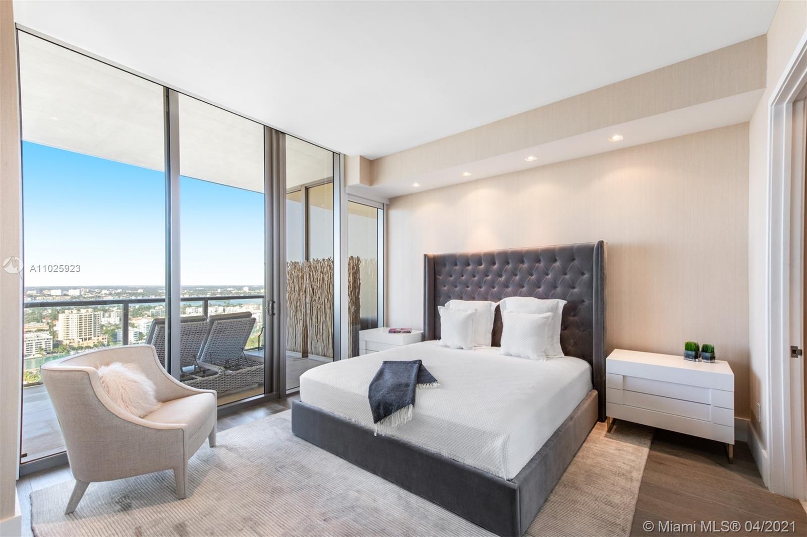 Luxurious bathroom with glass shower in St. Regis Bal Harbour Villa, Miami
