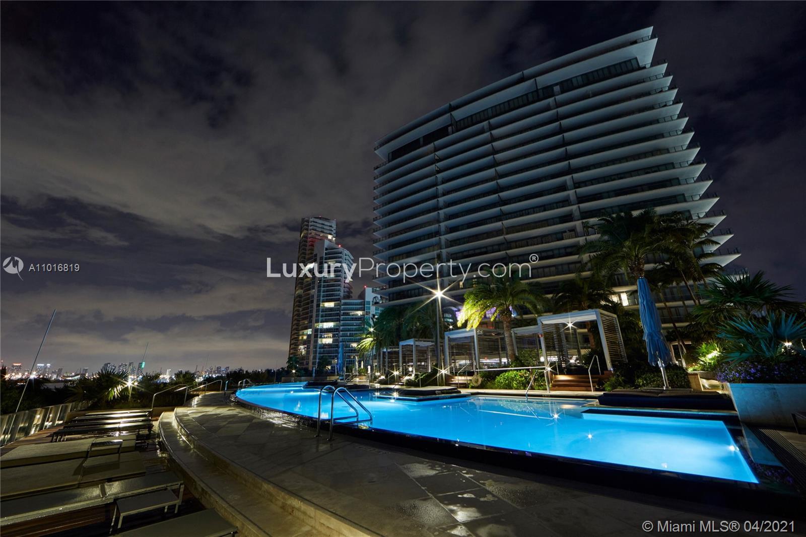 Aerial view of luxury sea view villa at 800 S Pointe Dr, Miami, Florida