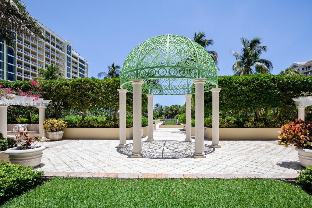 Garden view with statues at luxury villa on Key Biscayne, Miami