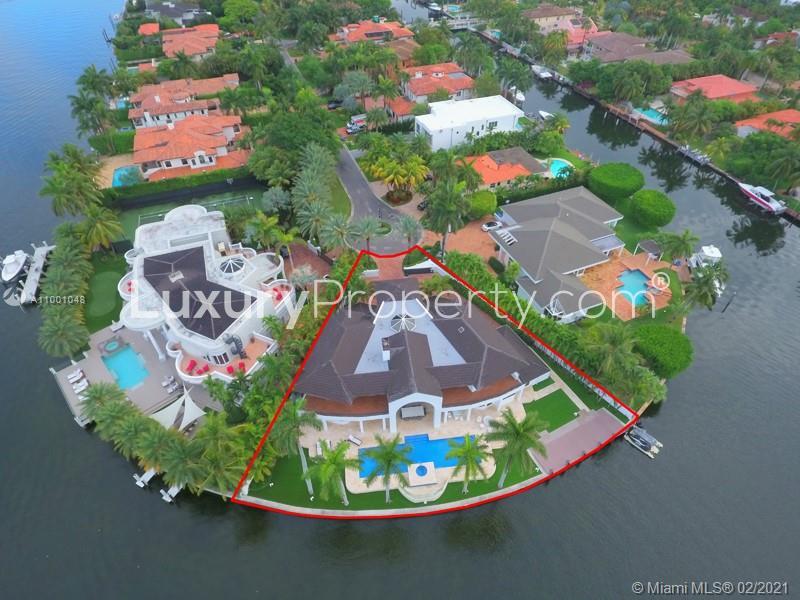 Aerial view of spacious villa for sale in Golden Beach, Florida, waterfront location