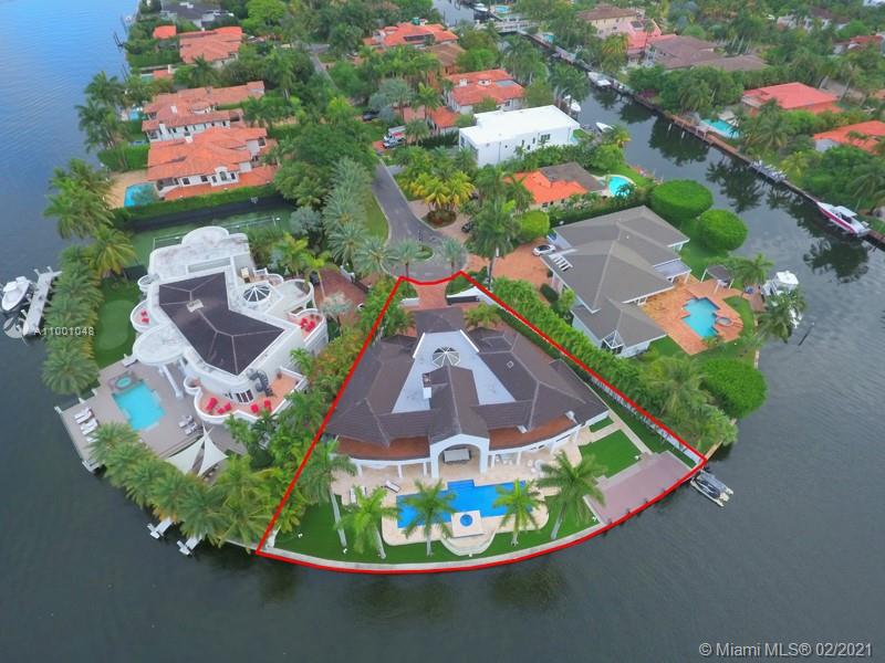 Aerial view of spacious villa for sale in Golden Beach, Florida, waterfront location