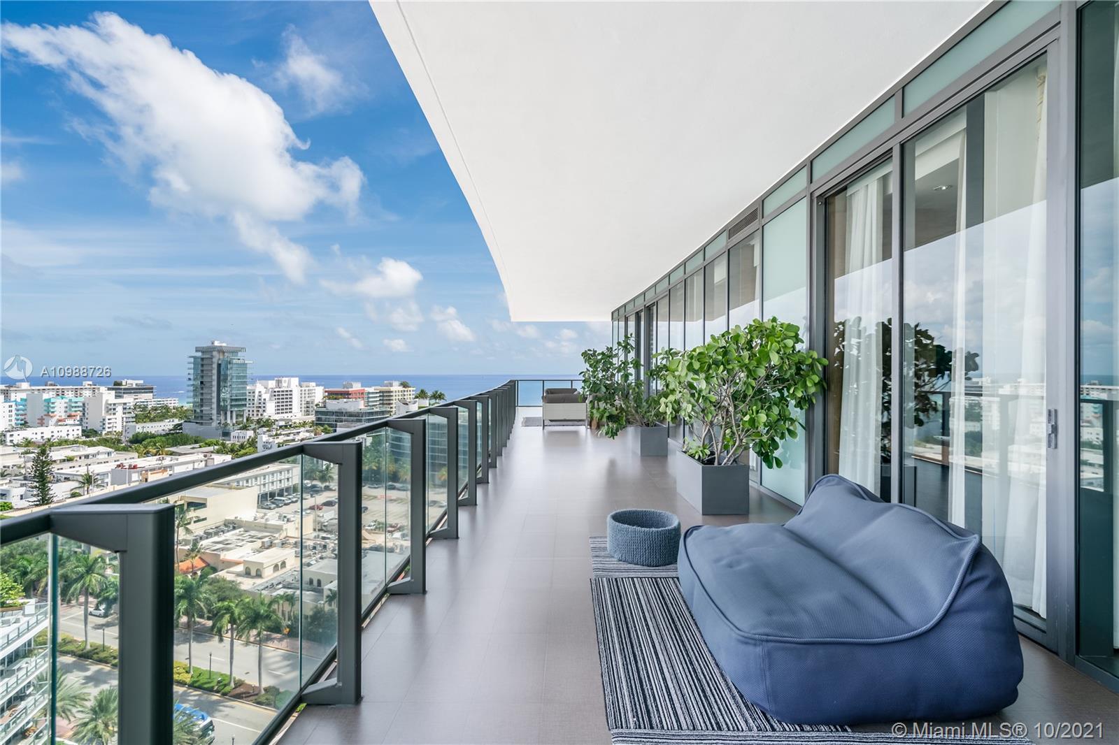 High floor Miami Beach condo balcony view, ocean and cityscape, 800 S Pointe Dr