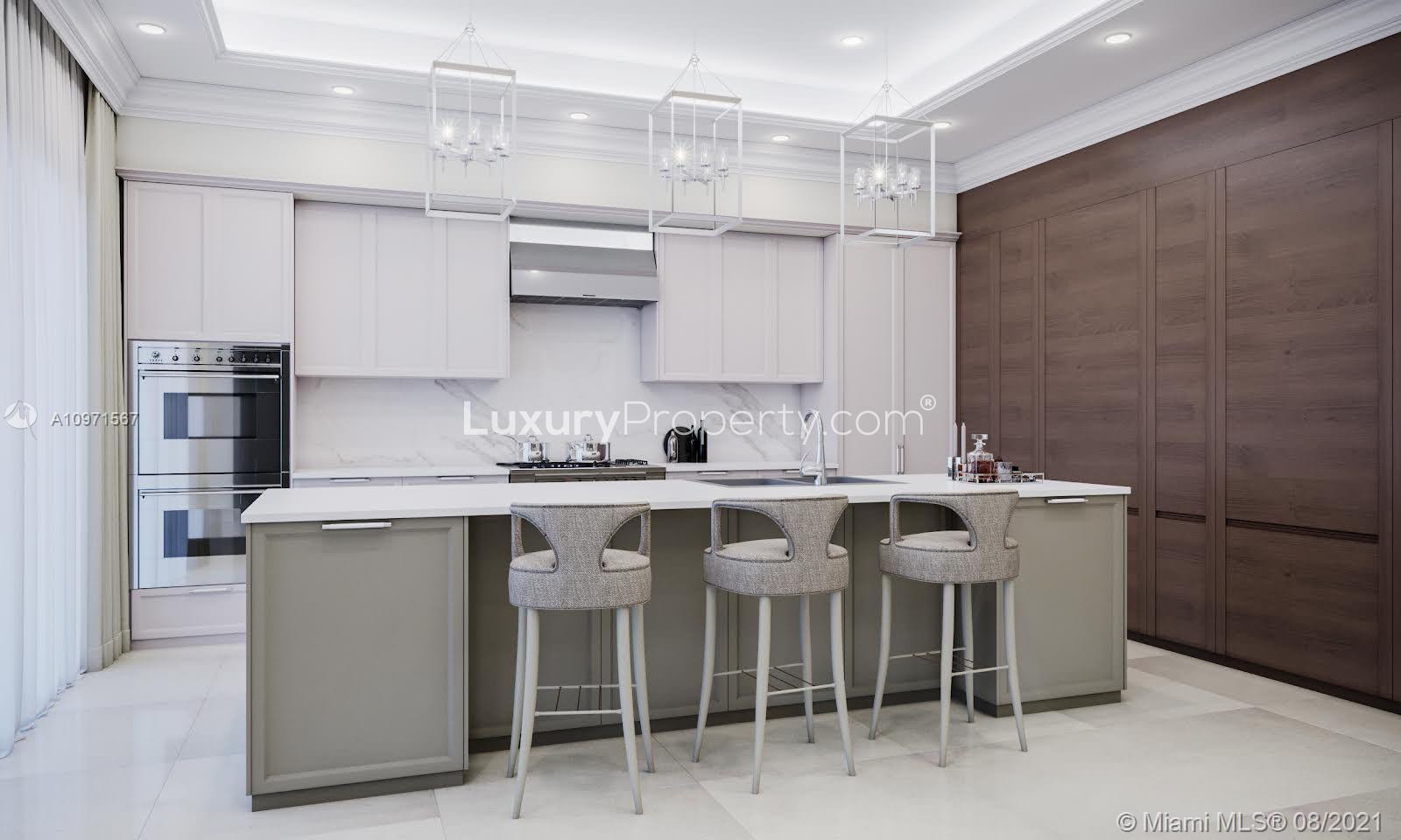 Elegant dining room with chandelier in brand new 5-bedroom Miami villa for sale