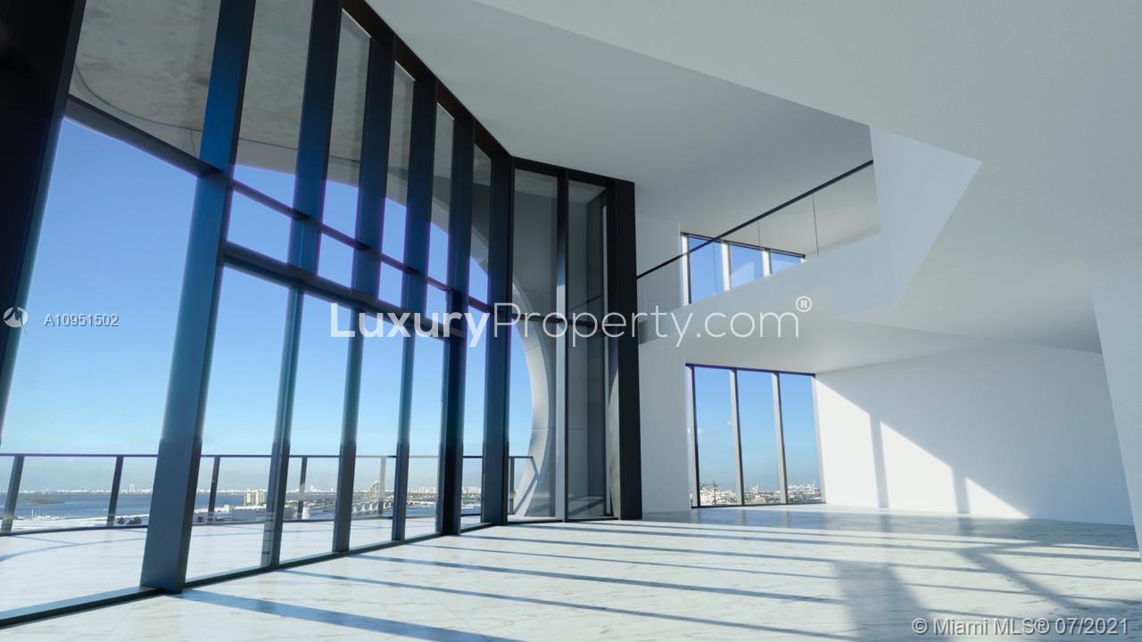 Elegant Miami villa interior with panoramic ocean views, featuring modern architectural design elements