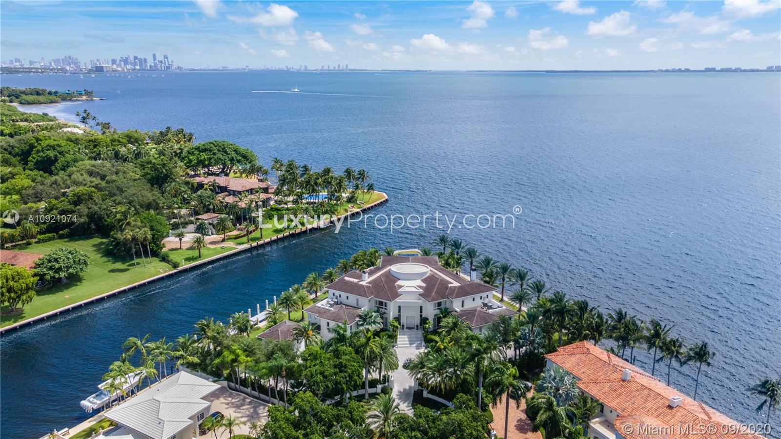 Waterfront view from villa at 41 Arvida Parkway, Miami, with skyline in distance