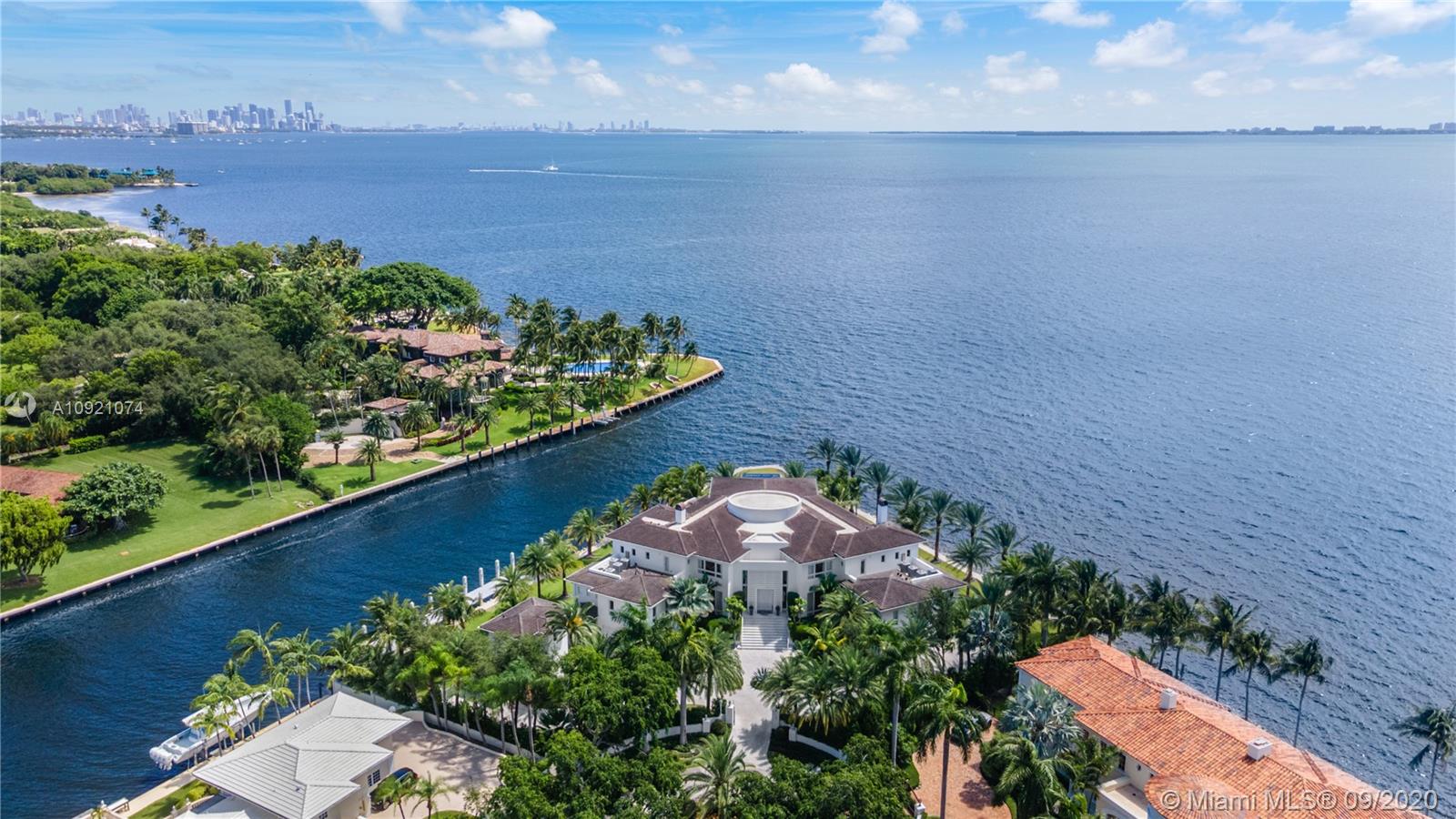 Waterfront view from villa at 41 Arvida Parkway, Miami, with skyline in distance