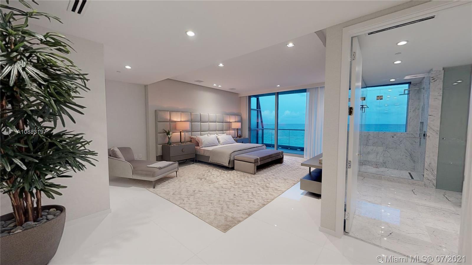 Fully furnished ocean-view villa interior with dining area at 9349 Collins Ave, Miami