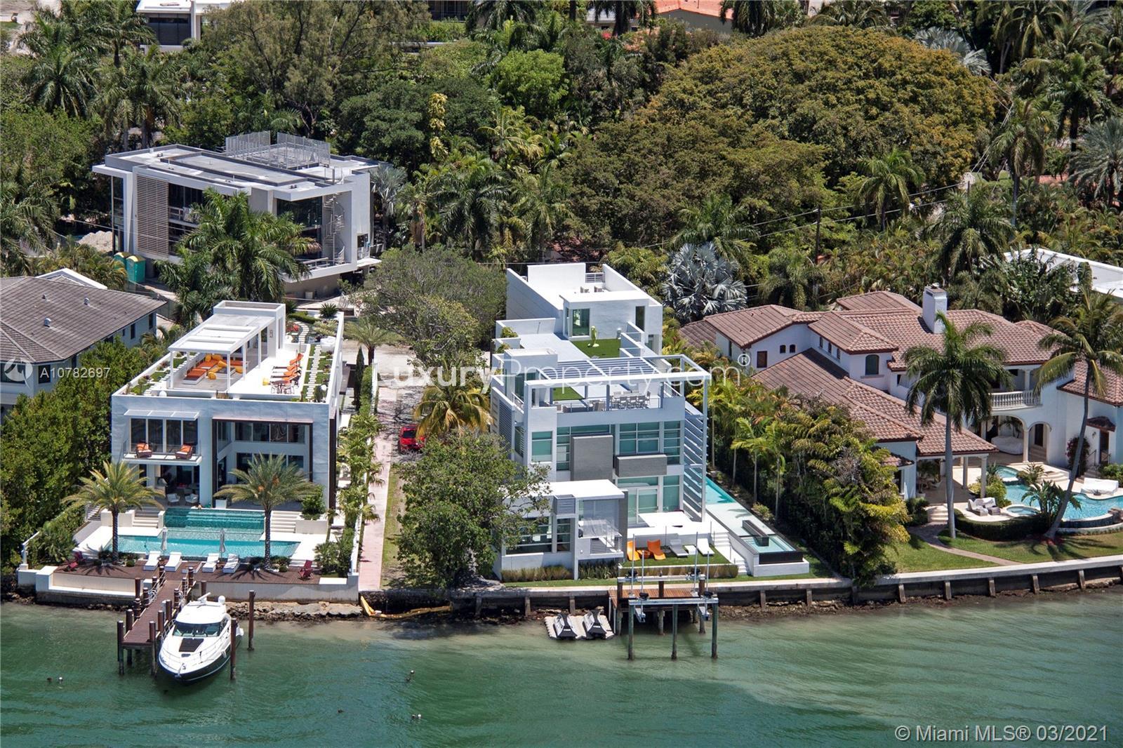 Tri-Level Miami waterfront villa with pool and dock at 440 S Hibiscus Dr for sale