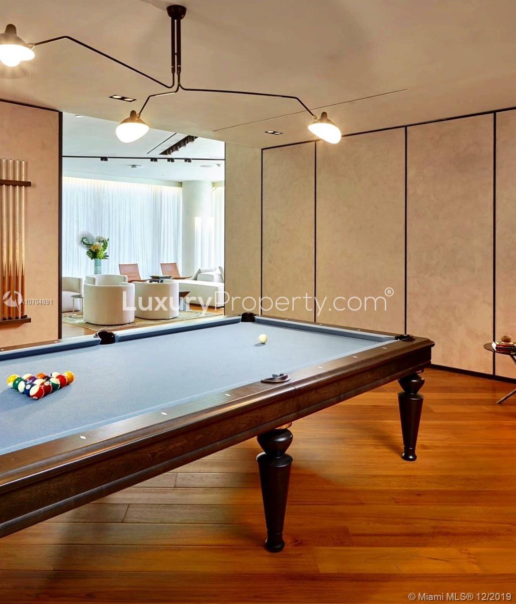 Children's playroom in Miami villa with colorful decor and modern furniture