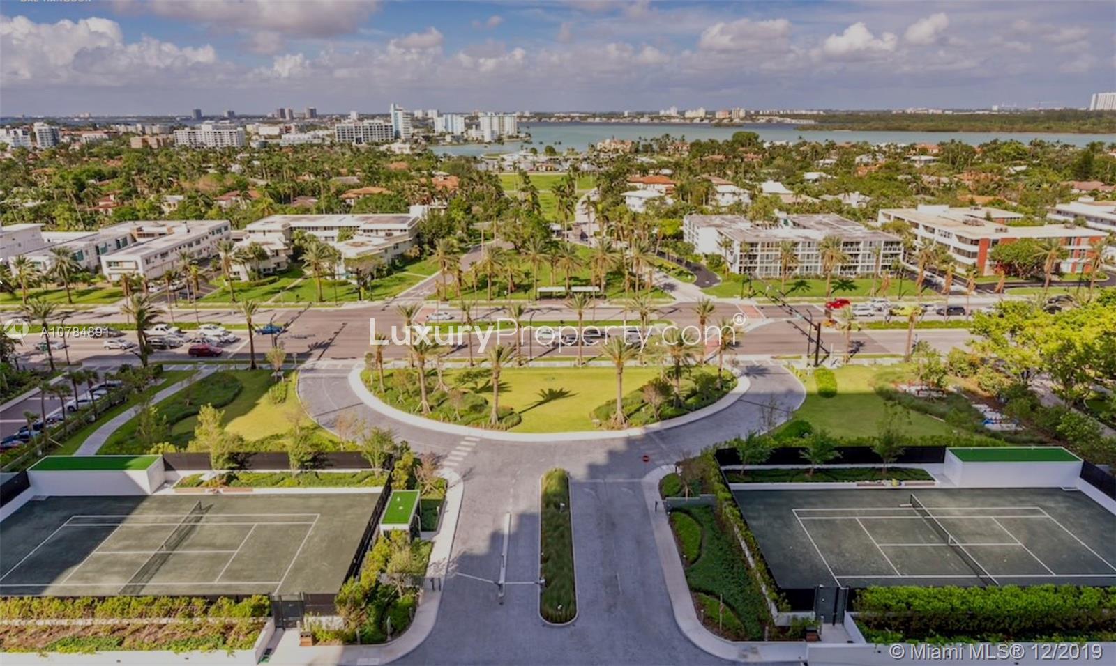 Luxury Miami villa balcony with stunning ocean views at 10201 Collins Ave, corner unit