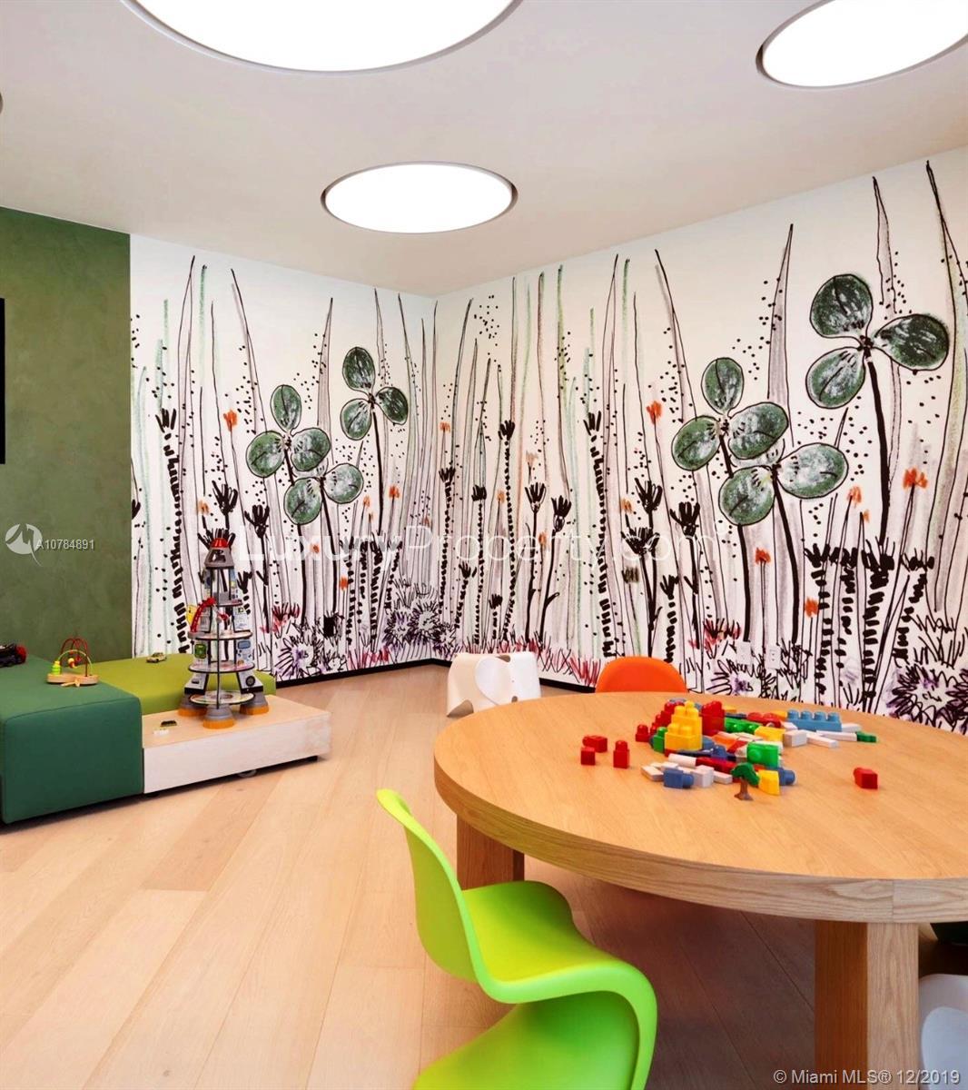 Aerial view of Miami community near 10201 Collins Ave villa with tennis court