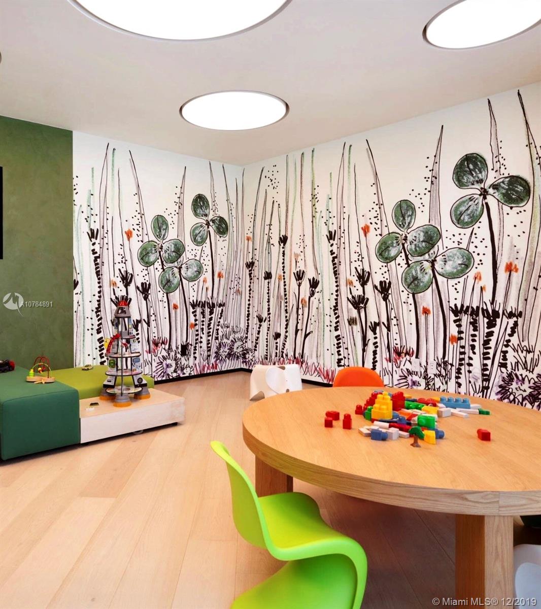 Aerial view of Miami community near 10201 Collins Ave villa with tennis court