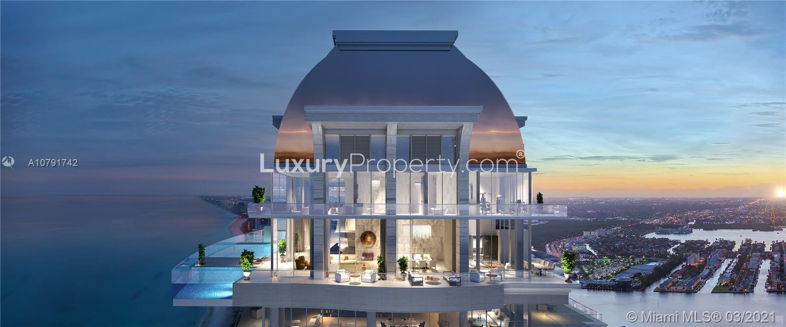 Luxury Miami villa living room with ocean views, glass staircase, and poolside terrace