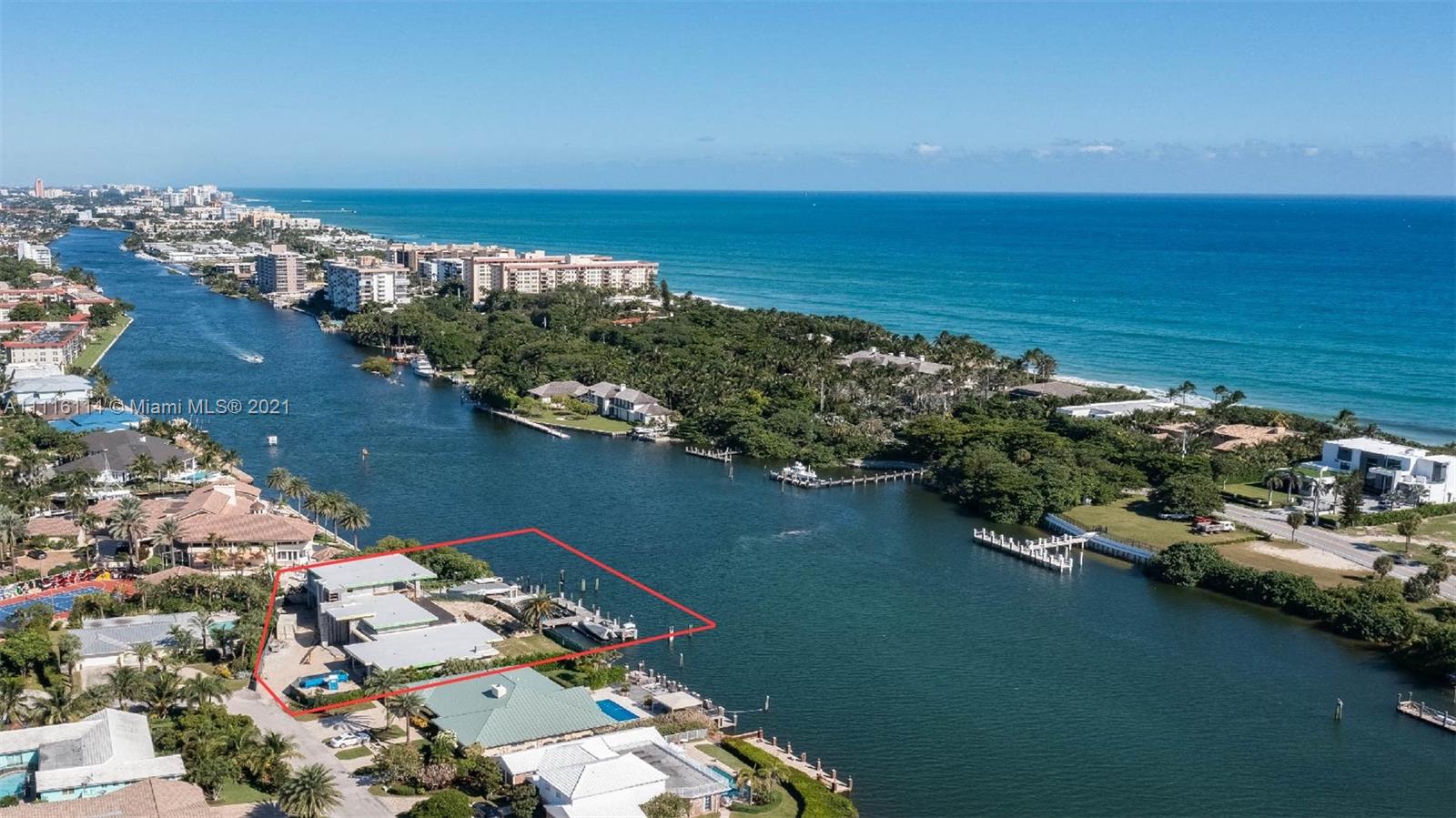 Aerial view of waterfront villa for sale in Miami, Florida, with private dock access