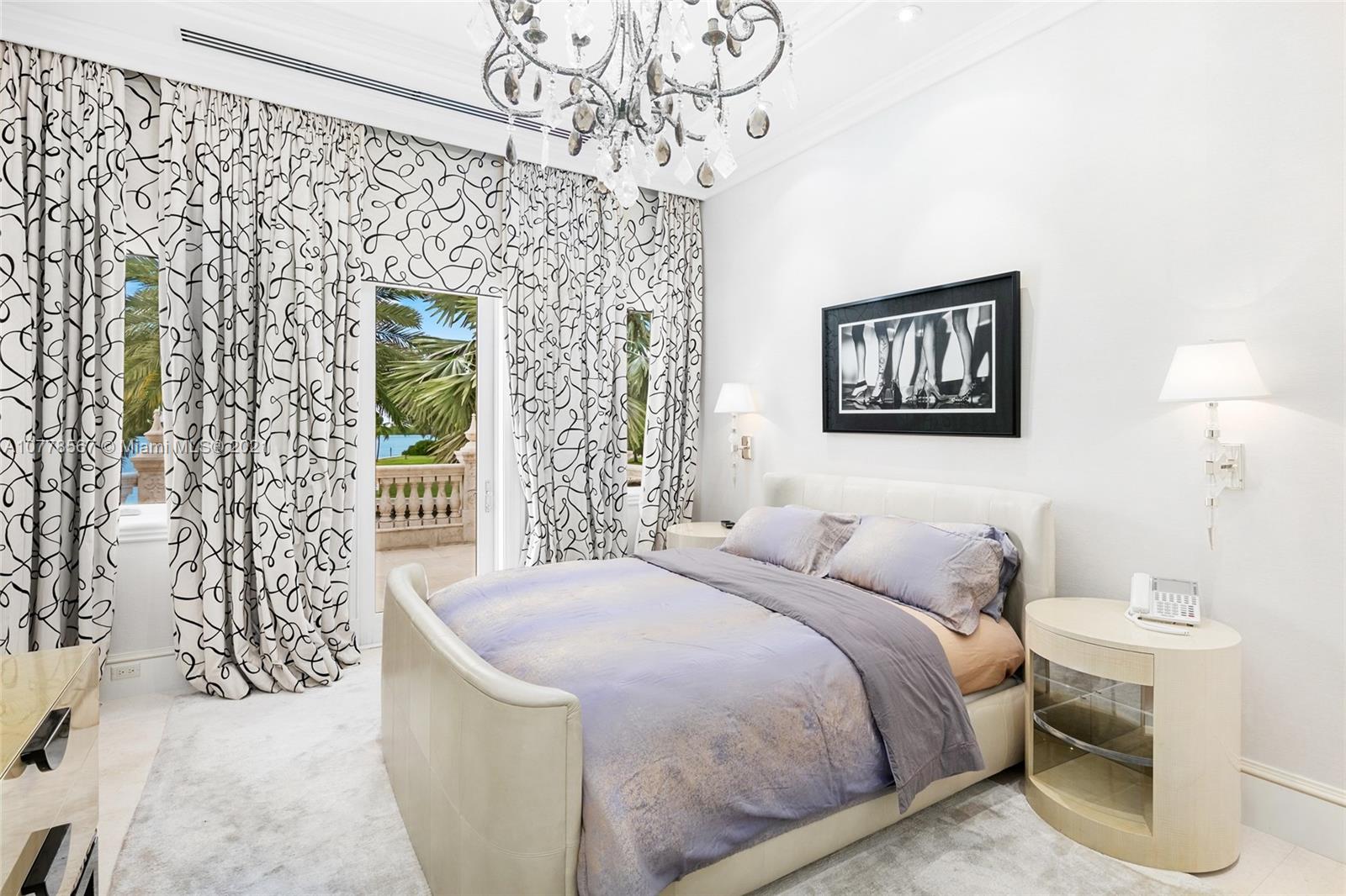 Luxurious bedroom in 8-bed villa, Bal Harbour, featuring elegant decor and natural light