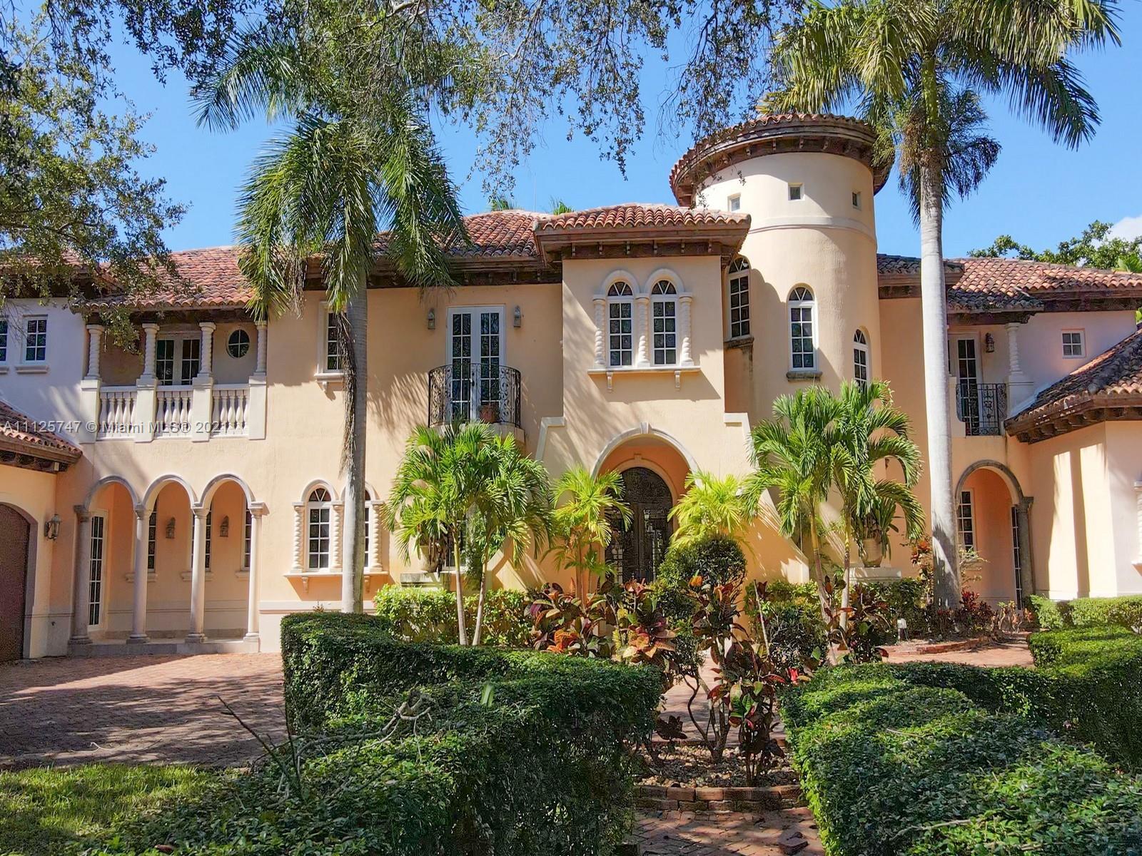 Luxury 8-bed villa exterior at 10550 Old Cutler Rd, Miami, for sale