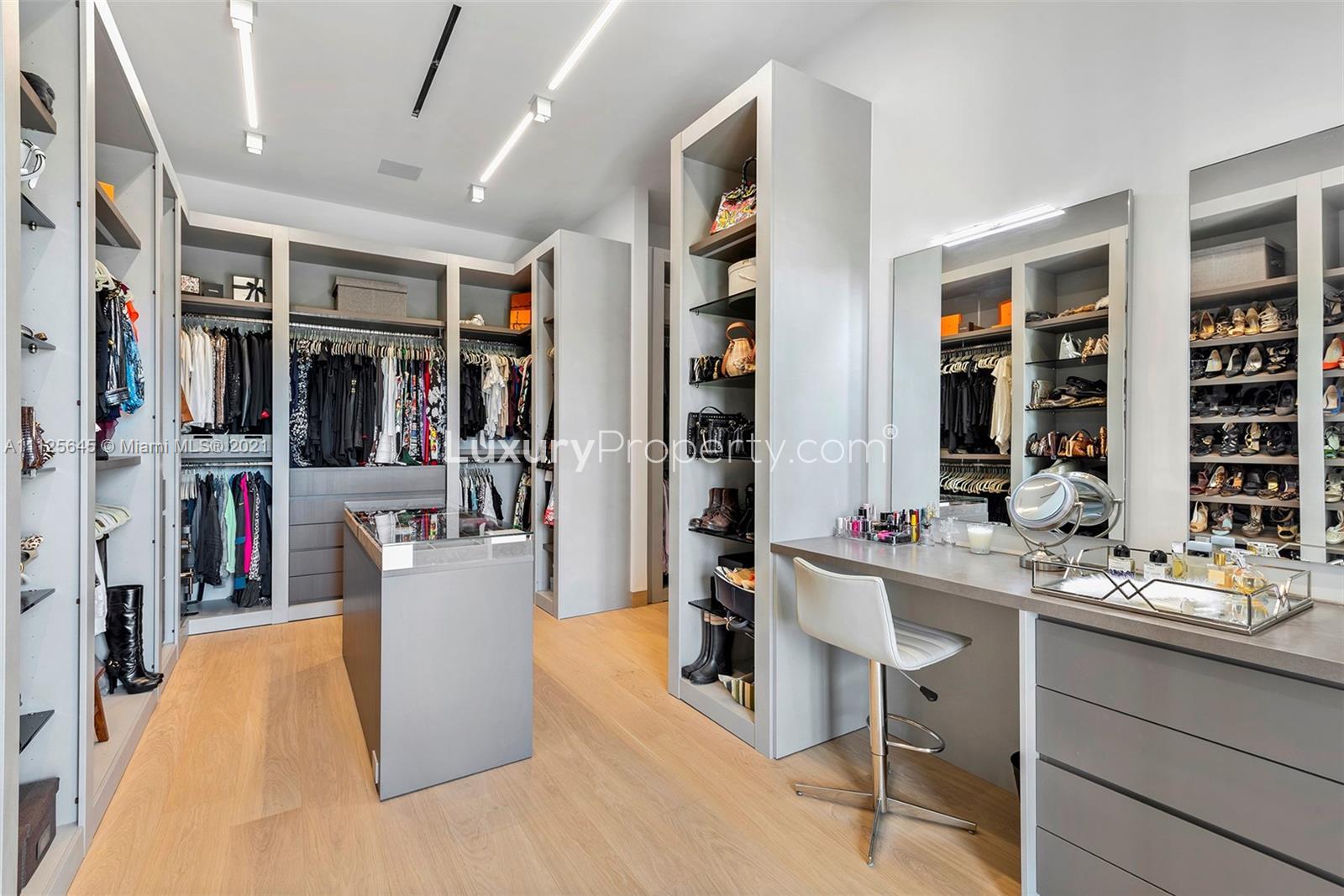 Luxurious marble bathroom in Miami villa with freestanding tub and modern fixtures