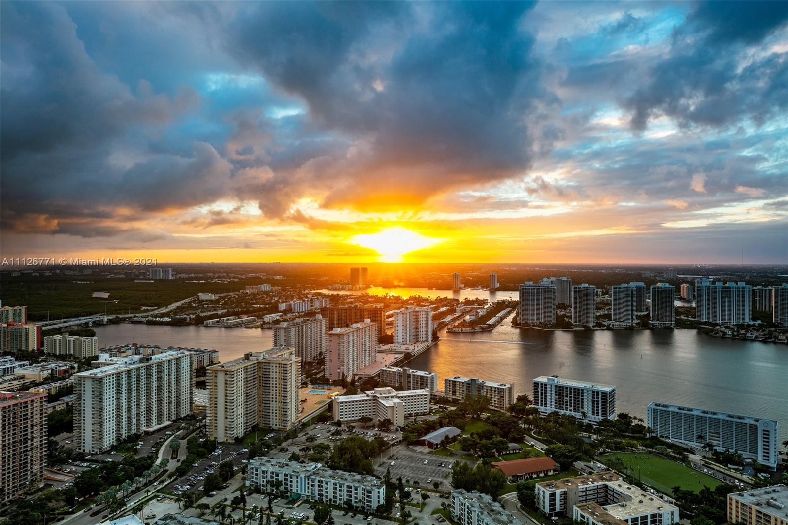 Aerial view of Miami skyline at sunset near oceanfront villa, Collins Ave, Florida
