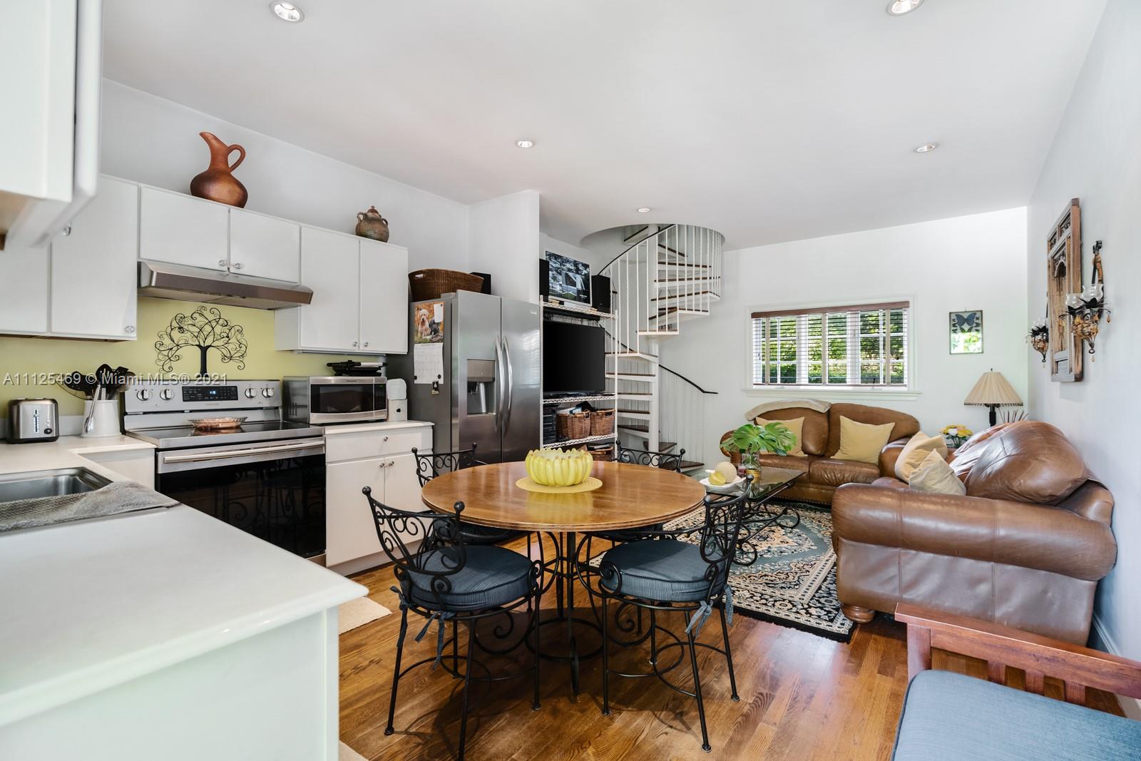 Luxurious bedroom in 9-bedroom waterfront villa, Miami, with modern furnishings and natural light