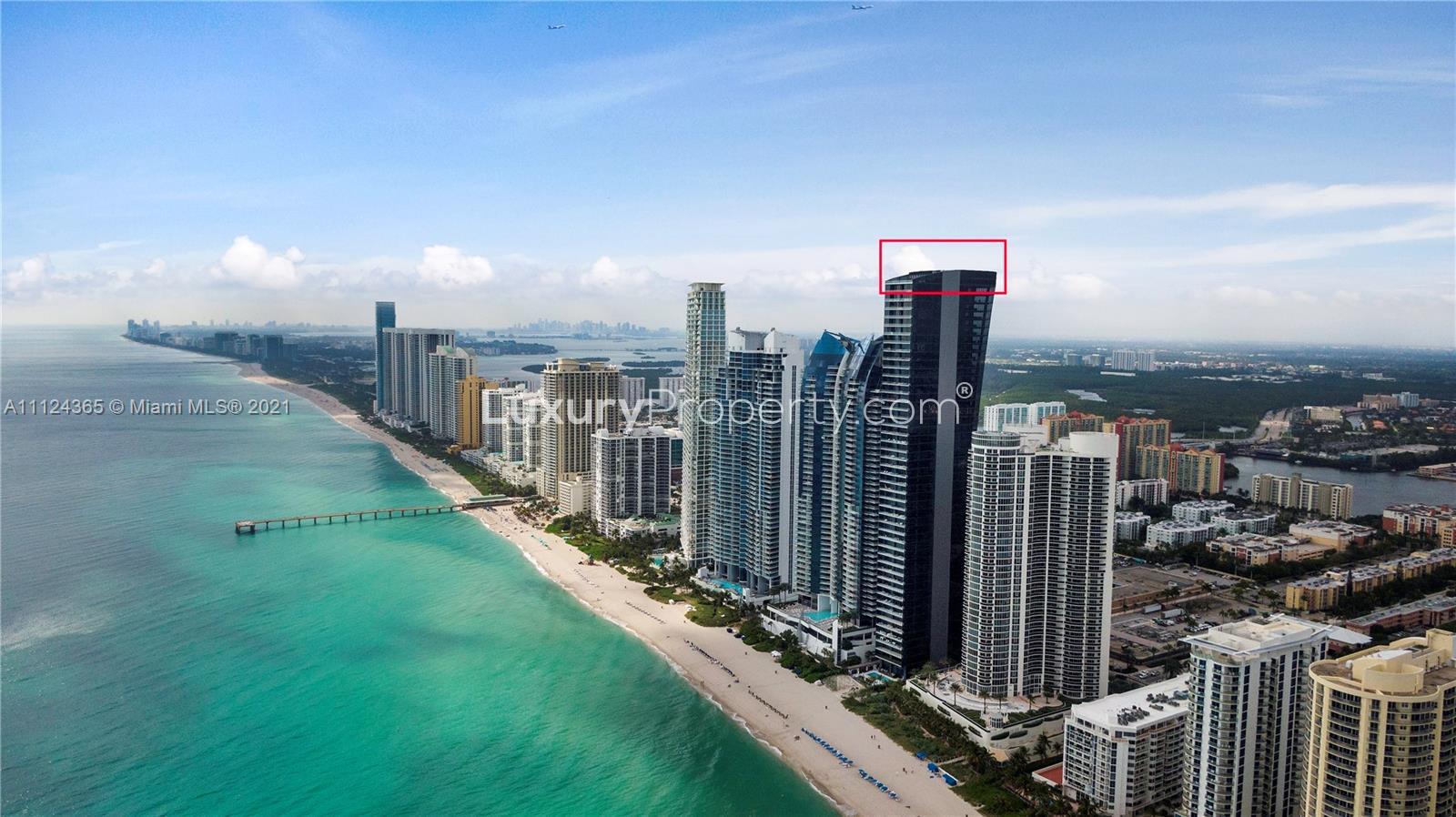 Aerial view of oceanfront penthouse at 17141 Collins Ave, Miami, for sale