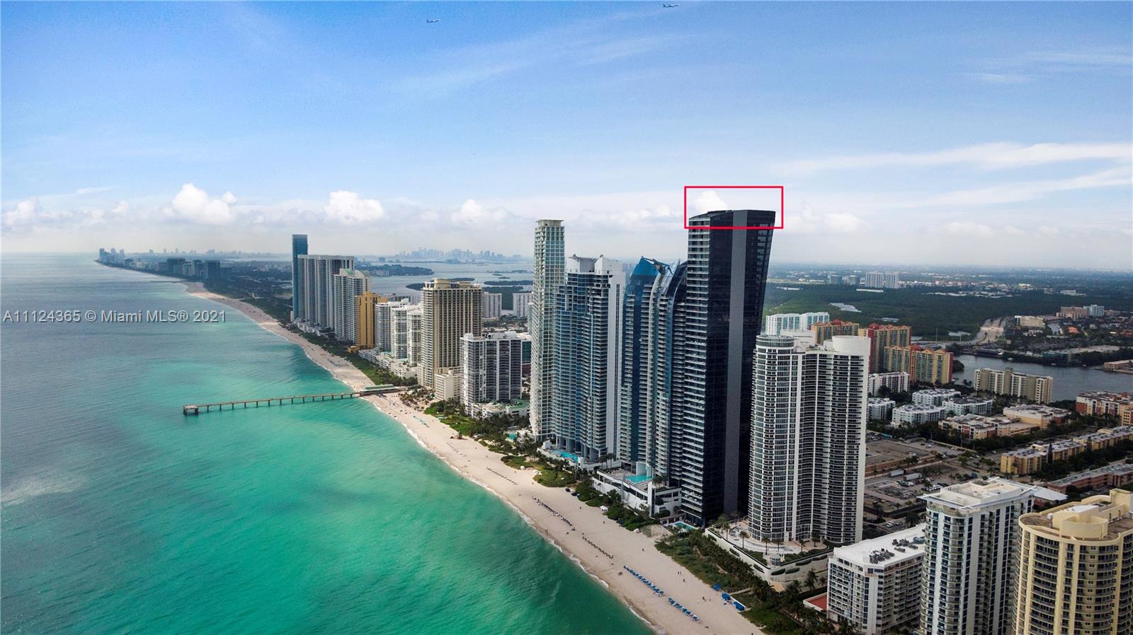 Aerial view of oceanfront penthouse at 17141 Collins Ave, Miami, for sale