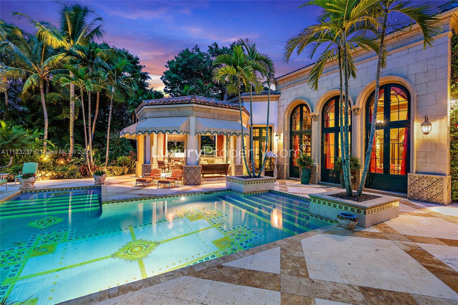 Luxury 7-bed waterfront villa with lush gardens at sunset, Hobe Sound, Florida