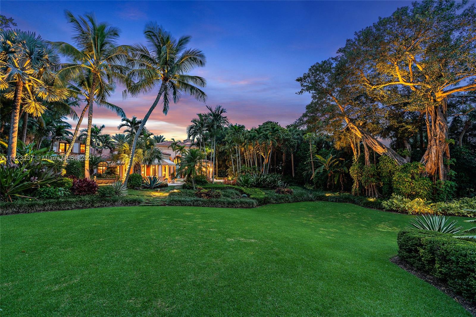 Luxury 7-bed villa entrance with lush landscaping, 312 South Beach Road, Hobe Sound, Florida