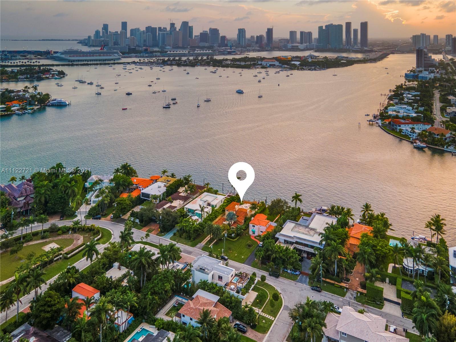 Aerial view of Miami villa for sale with waterfront and skyline backdrop, LP10105